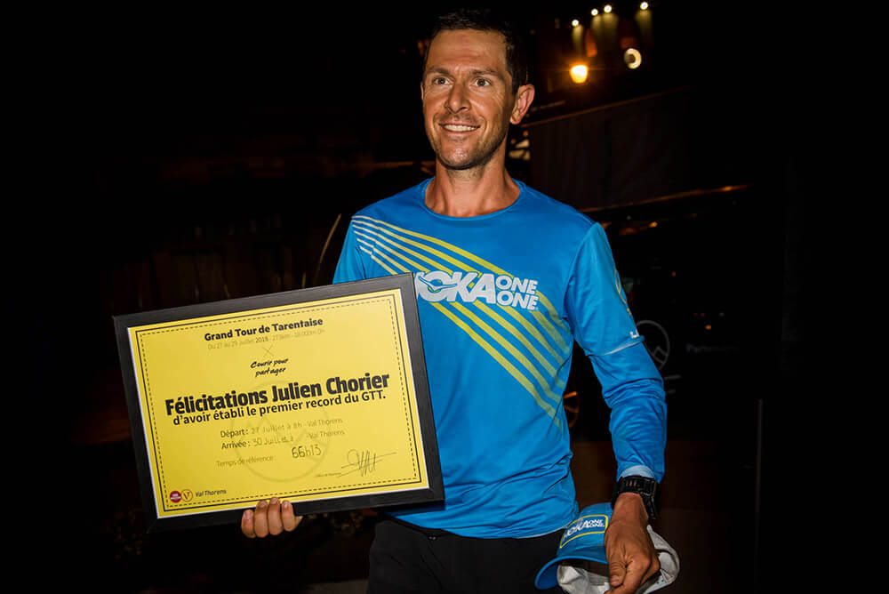 HOKA athlete Julien Chorier holds his record certificate