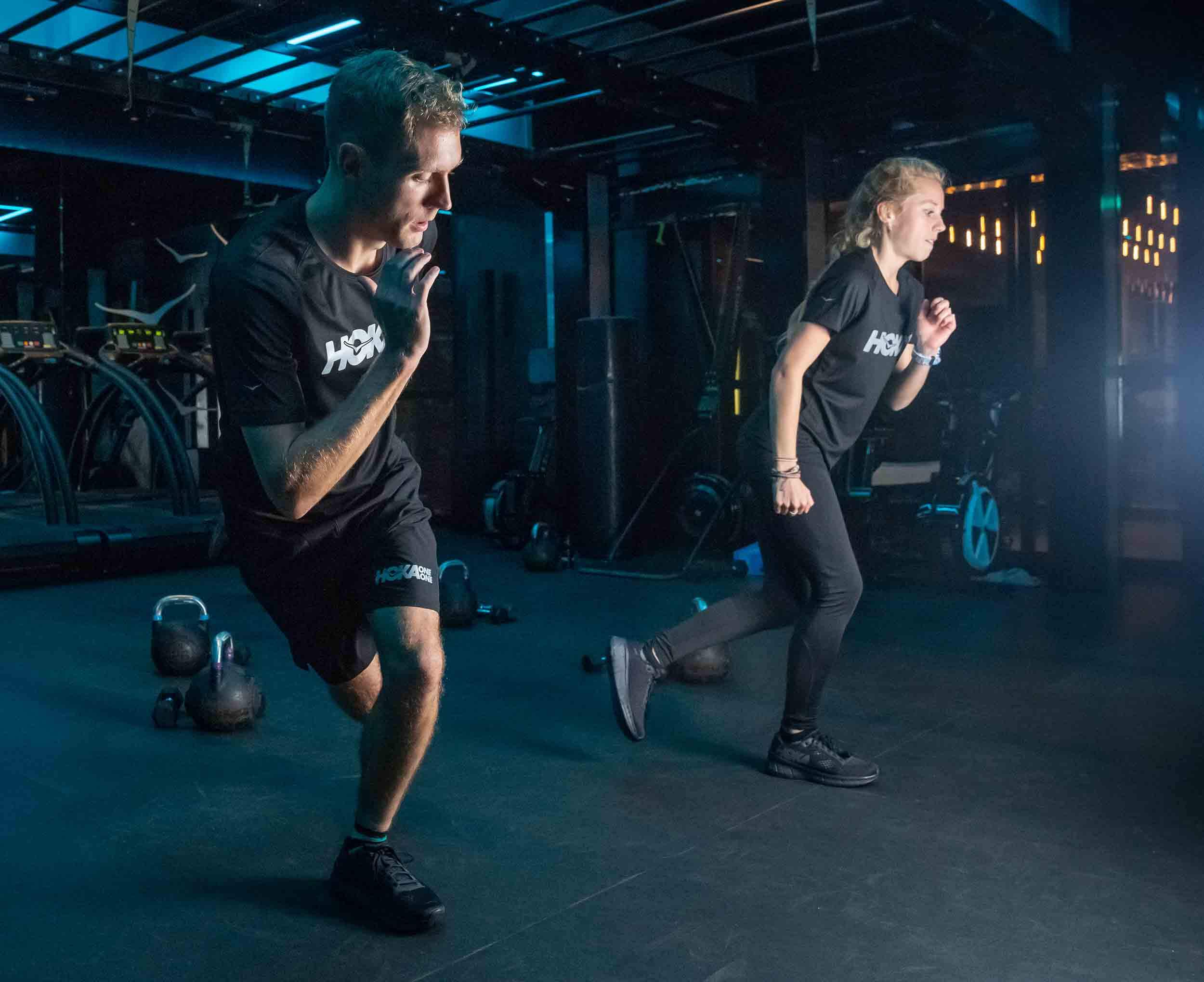 Participants do exercises at the HOKA Fly at Night event in London