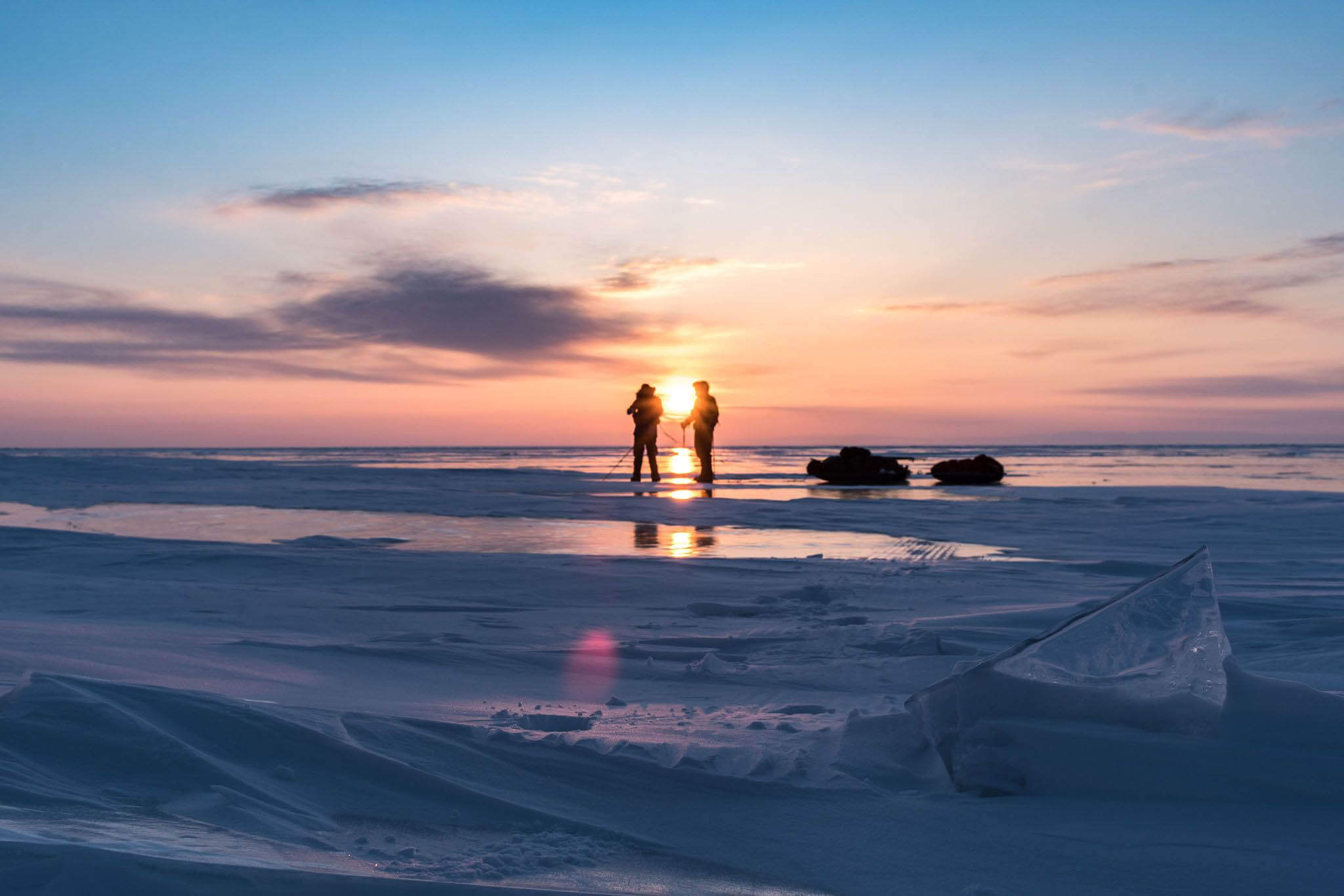 HOKA fan Rob Trigwell watches the sunset on Lake Baikal