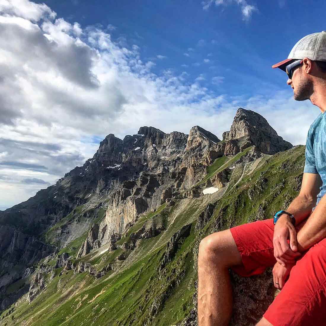 HOKA fan and Run the Wild founder Simon James looks out onto the mountain