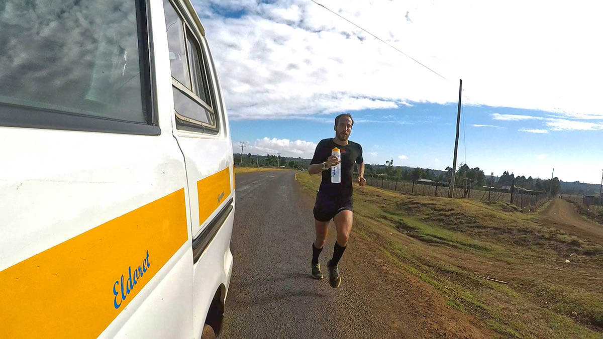 HOKA athlete Frank Schauer trains on the roads following a car