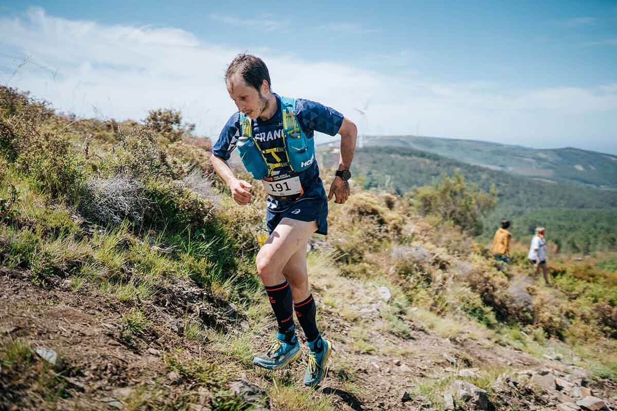 HOKA athlete Nicolas Martin runs up a hill