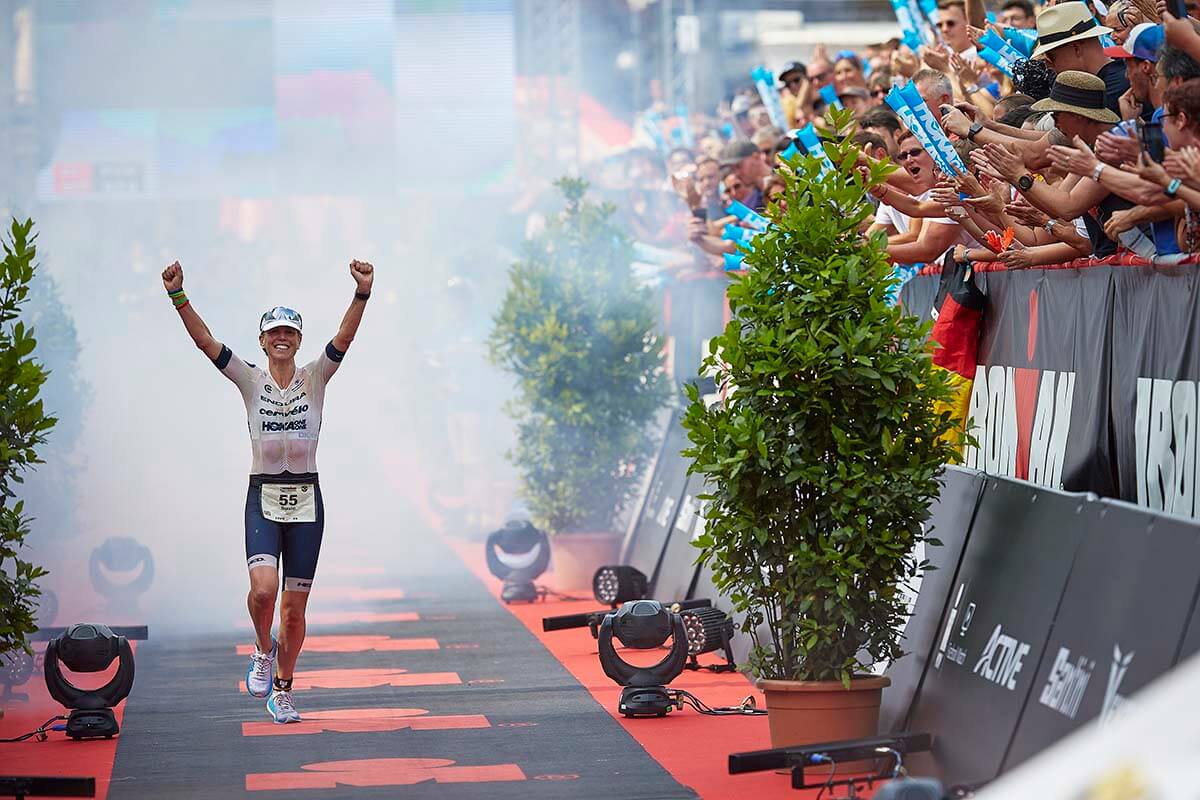 HOKA athlete Susie Cheetham celebrates winning Ironman Hamburg