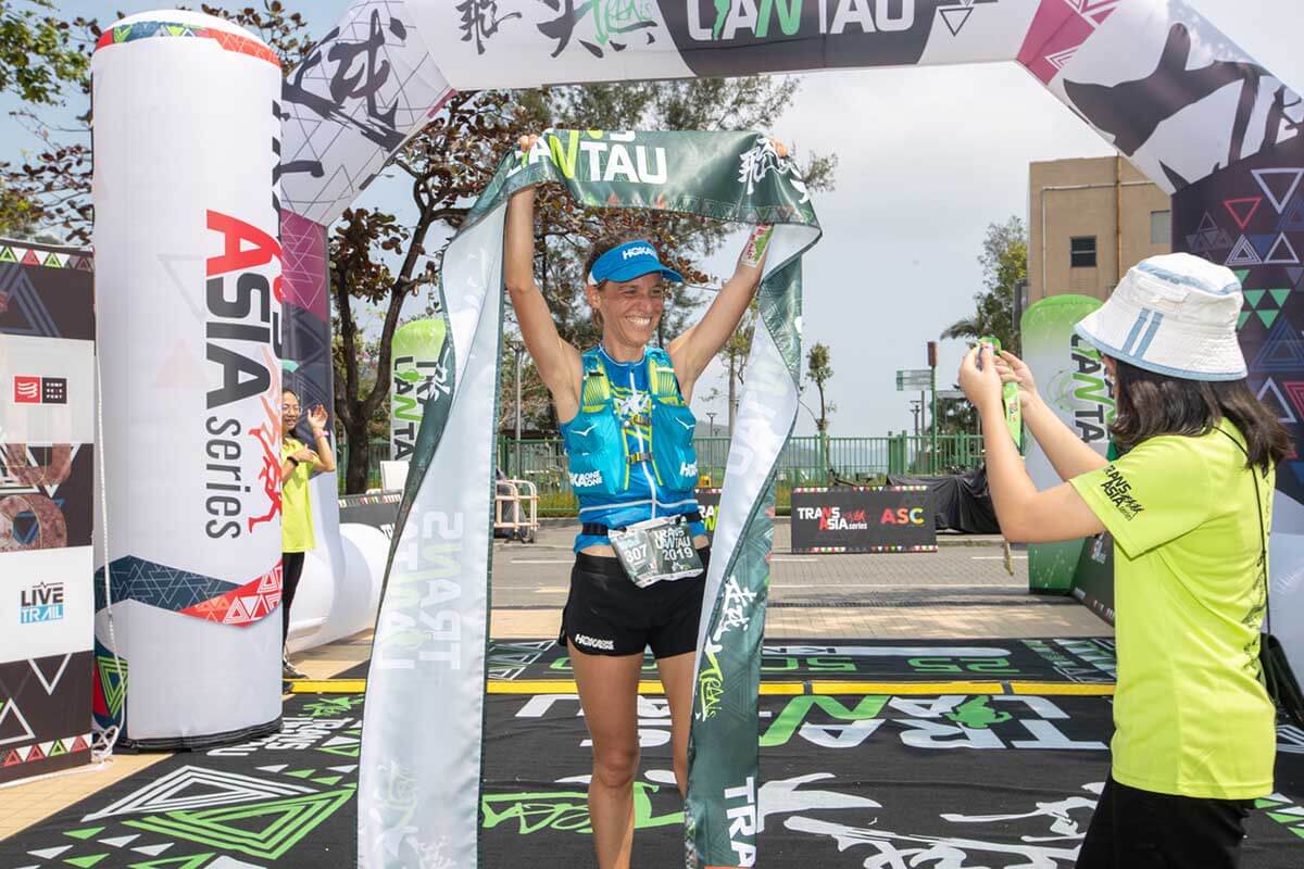 HOKA athlete Audrey Tanguy crosses the line first