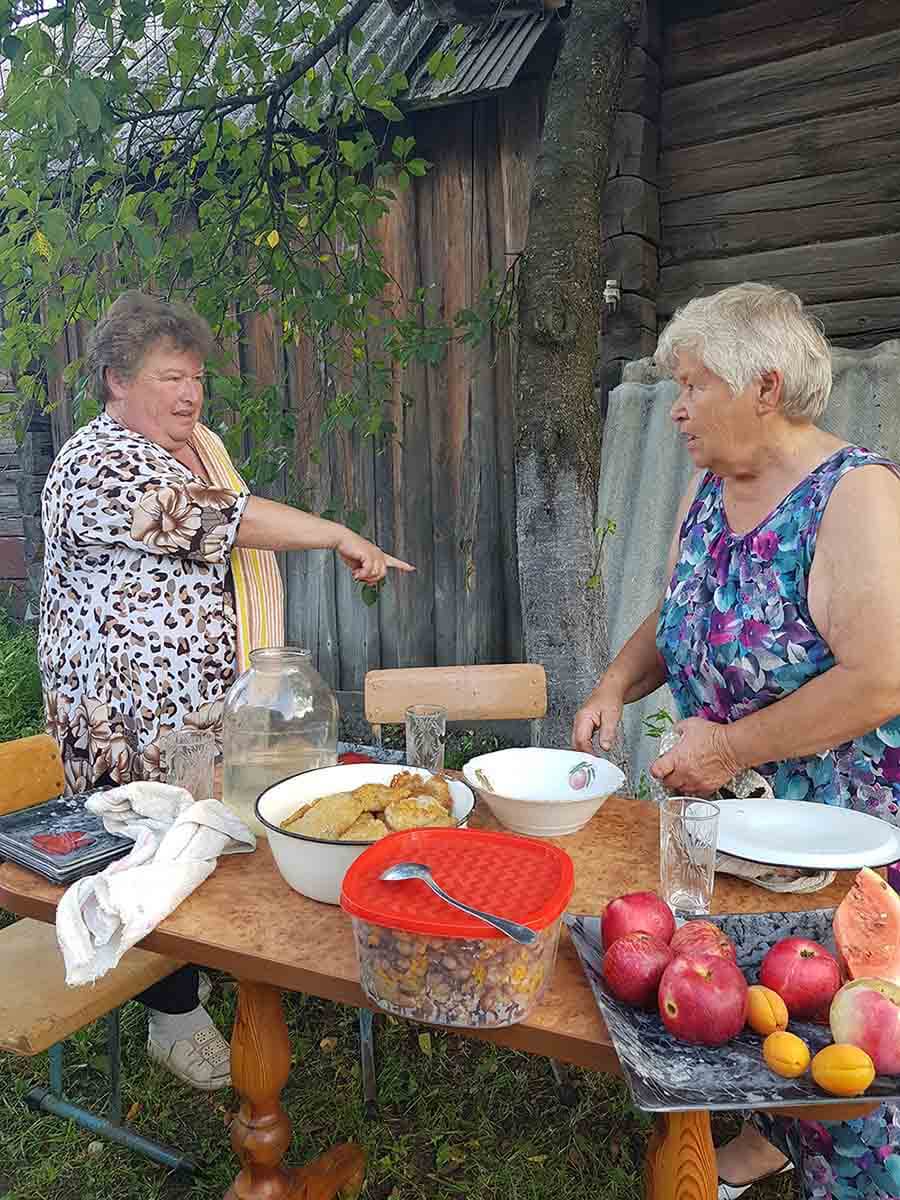 Two women from Belarus cook traditional food