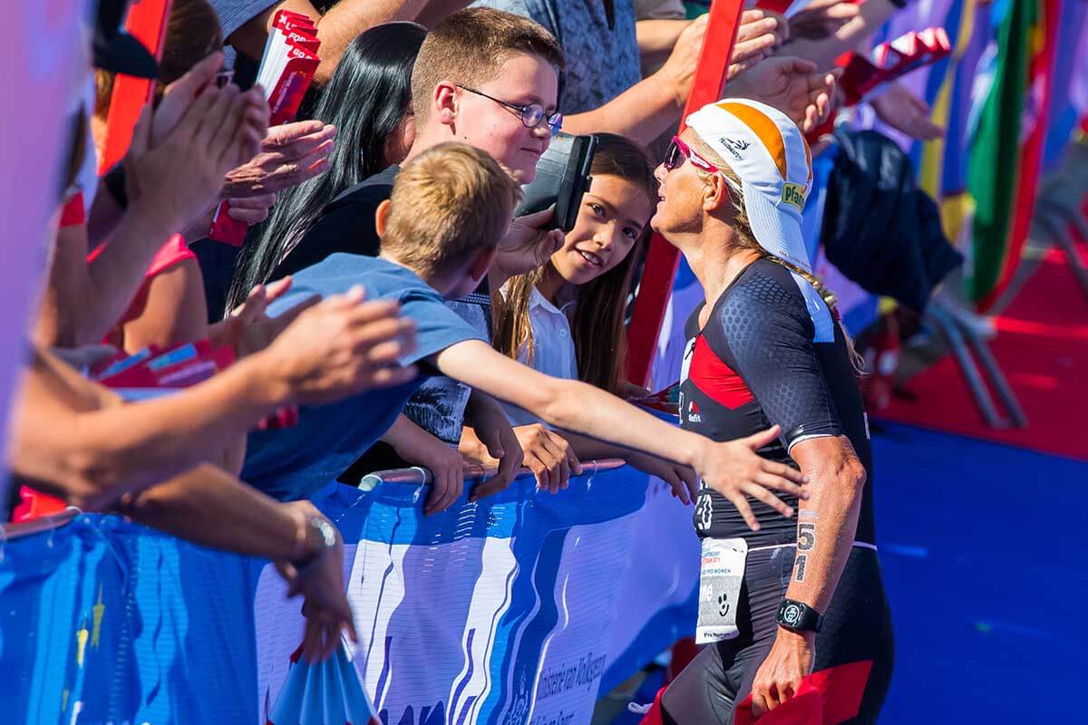 HOKA athlete Yvonne van Vlerken speaks to fans at the end of Challenge Almere