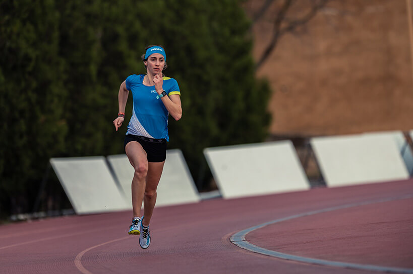 HOKA athlete Lucie Lerebourg sprints round the bend